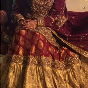 Elegant Maroon and Gold Embroidered Bridal Dress